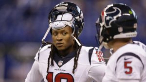 Houston Texans' DeAndre Hopkins talks with Brandon Weeden (5) before the start of an NFL football game between the Indianapolis Colts and the Houston Texans, Sunday, Dec. 20, 2015, in Indianapolis. (AP Photo/Michael Conroy)
