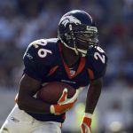 DENVER - SEPTEMBER 22: Running back Clinton Portis #26 of the Denver Broncos runs with the ball during the NFL game against the Buffalo Bills on September 22, 2002, at Mile High Stadium in Denver, Colorado. The Broncos won 28-23. (Photo by Brian Bahr/Getty Images)